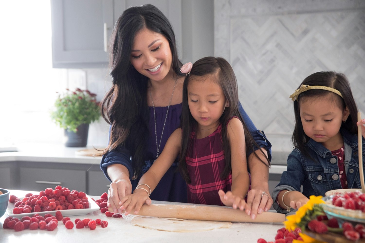 mom and daughters cooking